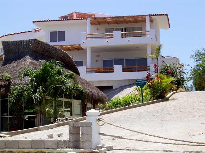 Beachfront two story villa by the boat dock at ¨Vallarta Gardens¨, luxury beachfront villas for sale in Puerto Vallarta.