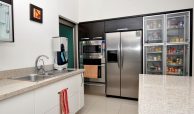 Cocina moderna de calidad con acero inoxidable en Villas en venta en El Tigre, Nuevo Nayarit.