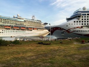 Norwegian and Princess international cruises docked in Puerto Vallarta on a sunny day.
