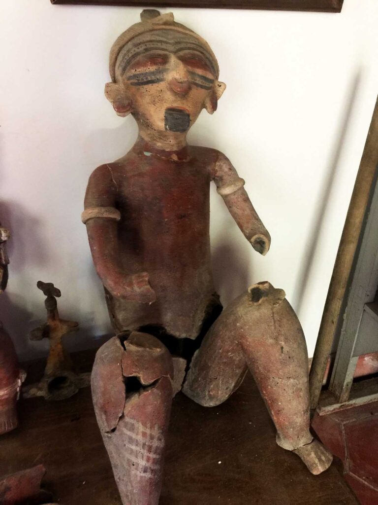 Asian red clay sculpture found in a museum that belongs to the church of San Sebastian