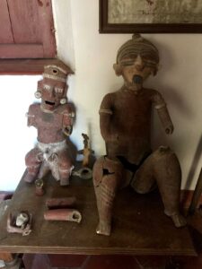 red clay sculptures found in ruins in puerto vallarta